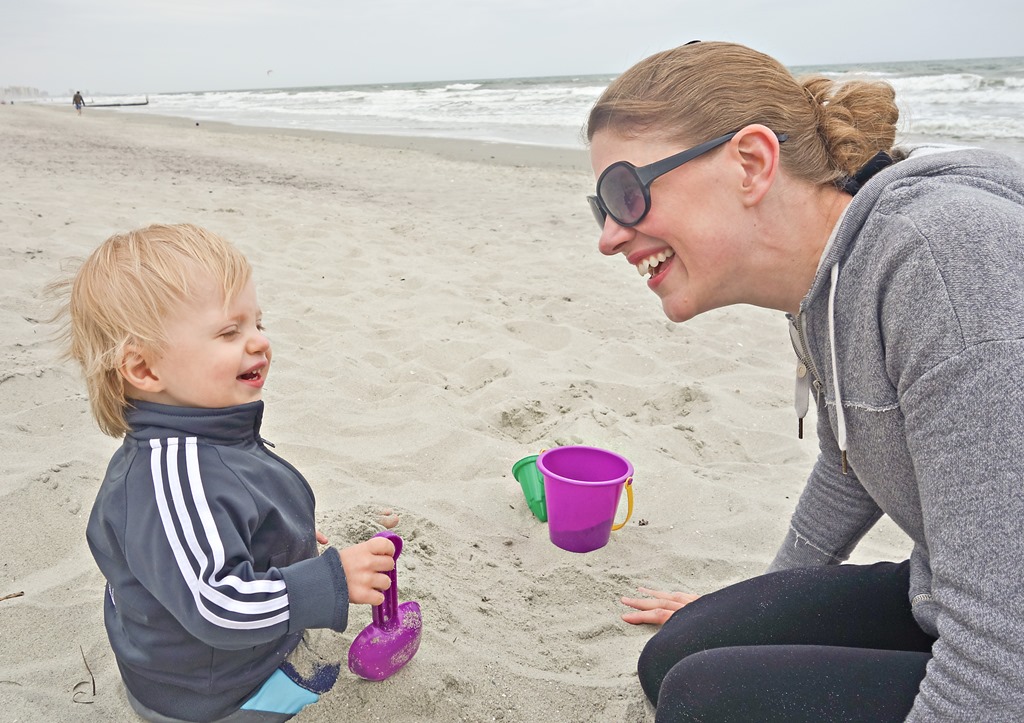 Mother-and-Child-Laughing-on-Beach